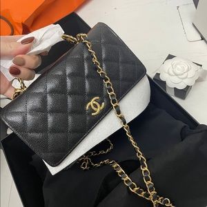 Brand new CHANEL WOC with handle in caviar leather and gold tone hardware.
